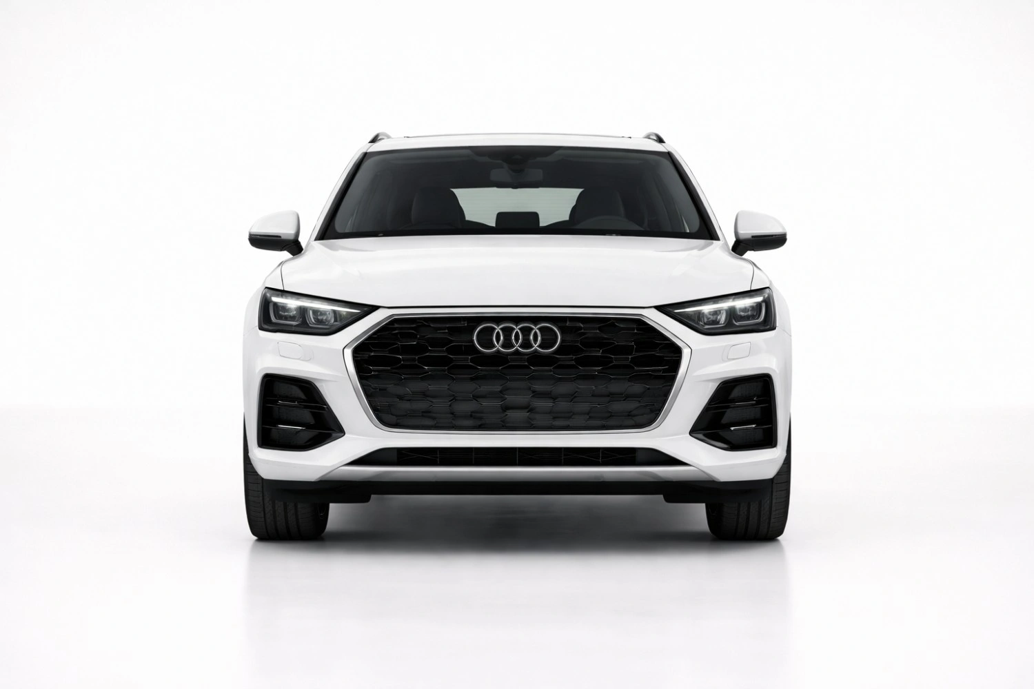 Audi Q8 front view showing signature octagonal grille, LED headlights, and commanding presence