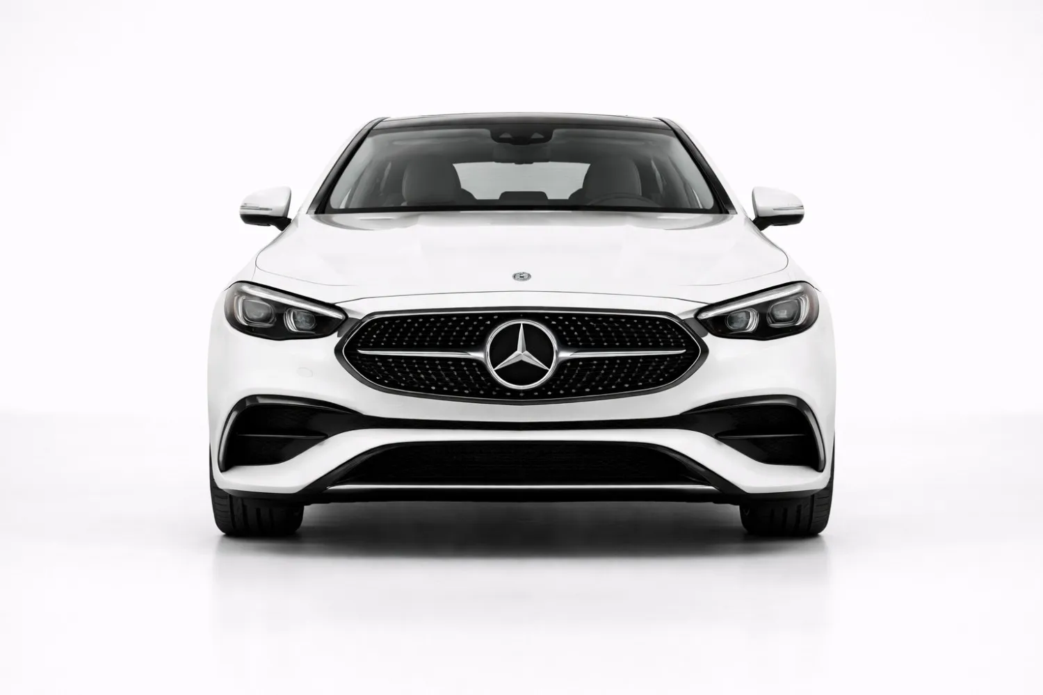 Mercedes E Class front view showing signature grille, LED headlights, and executive luxury stance