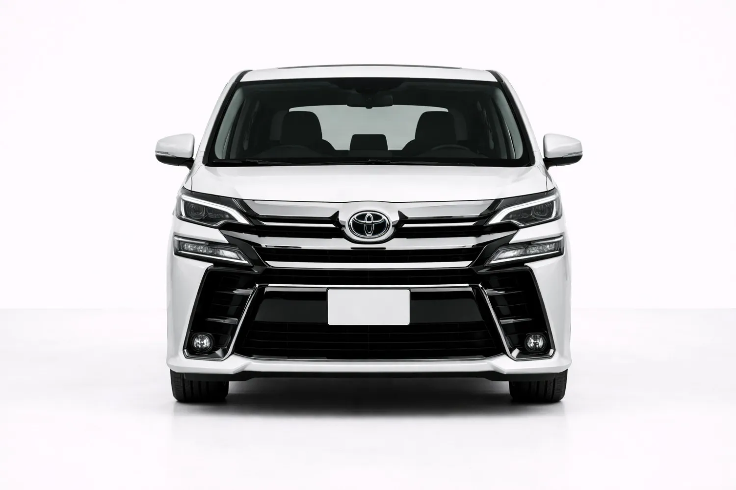 Toyota Vellfire front view showing bold grille, sharp LED headlights, and luxury MPV presence