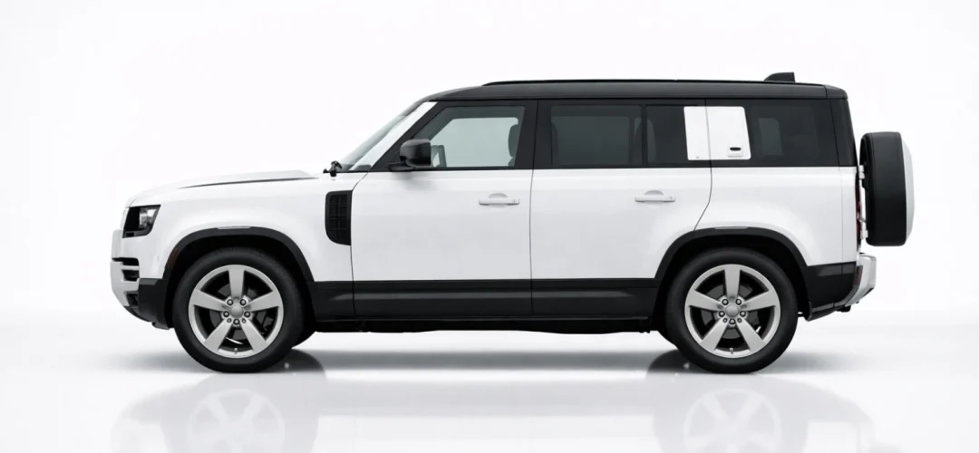 Land Rover Defender side profile displaying boxy silhouette and rugged SUV proportions