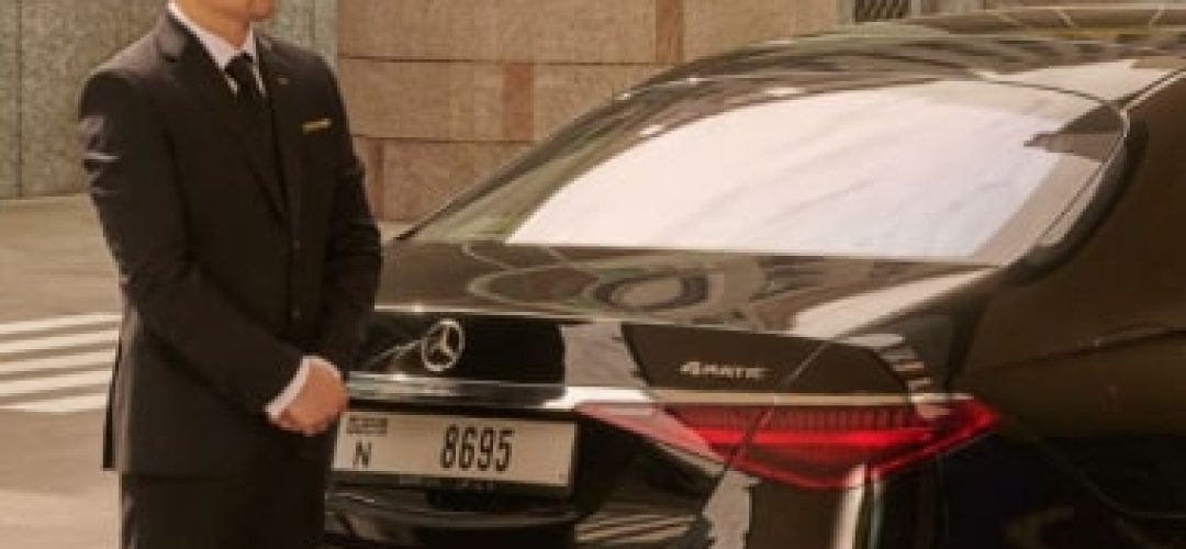 chauffeur with luxury car
